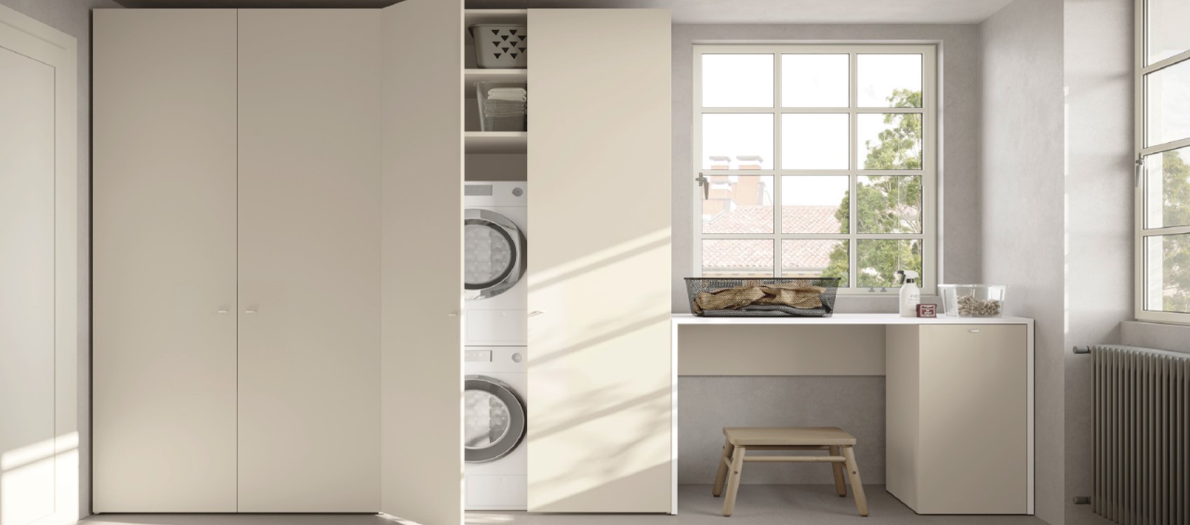 Utility room in Canapa by Colombini with tall washer dryer cupboard and low base units